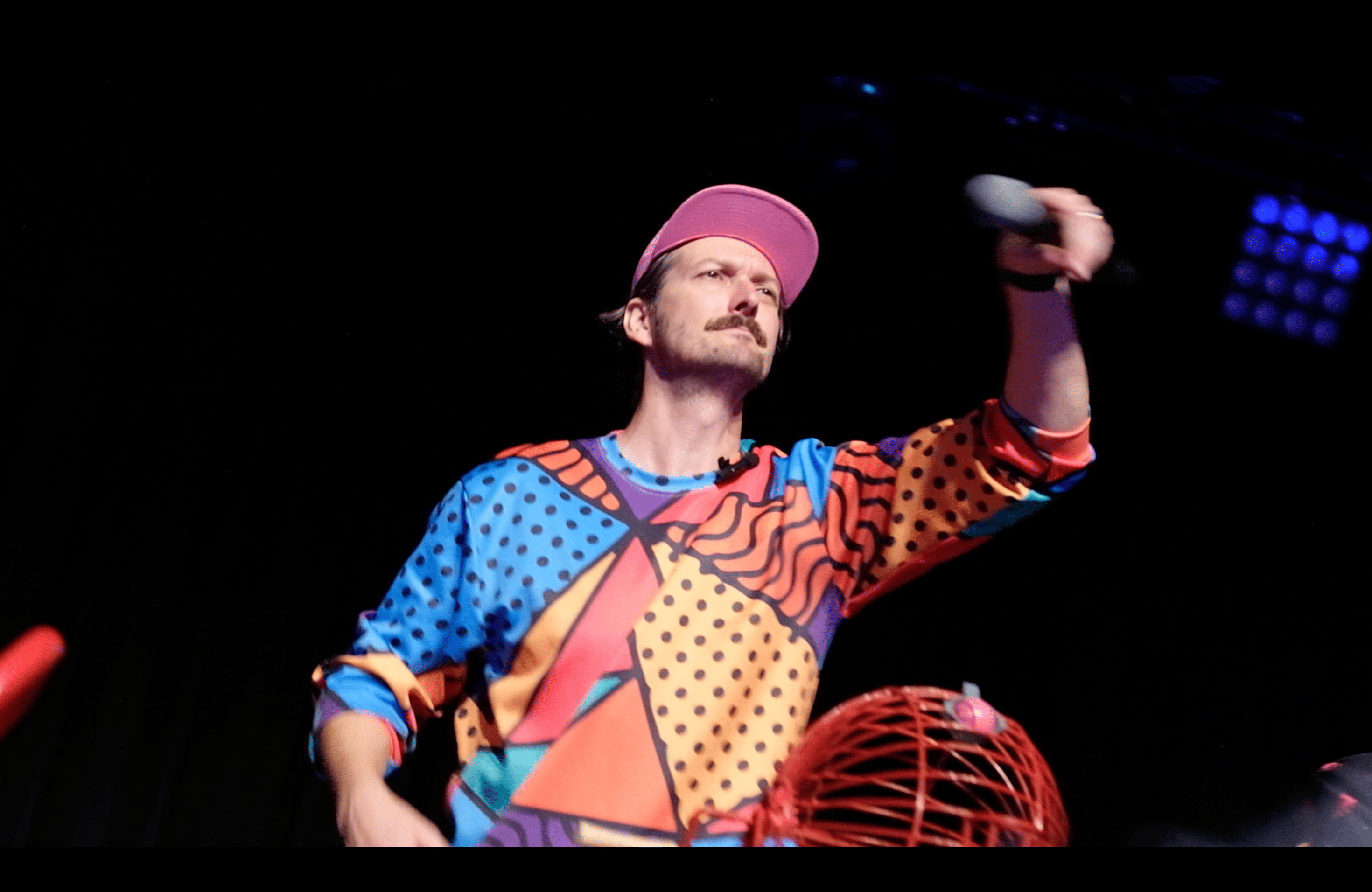 conference entertainment with live host and DJ on stage